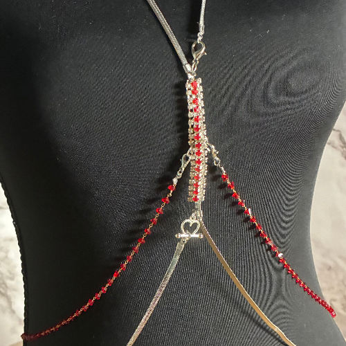 Red beads and silver body chain harness
